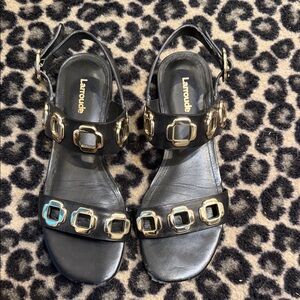 Larroude Black Leather Sandals with Gold Buckle Details